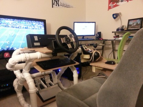 Keyboard mounted to the bottom and the two step mount for the mouse and shifter on the right side of the rig.